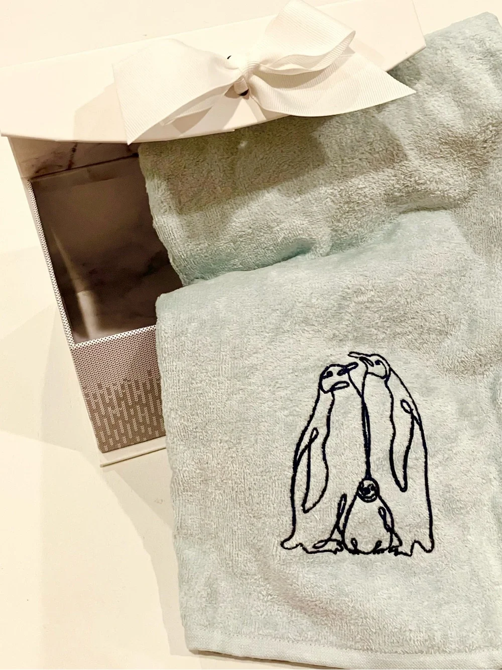 Light Blue Plush Throw with Embroidered Penguin Design